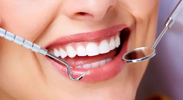 خرابی دندان علتی بر درد معده