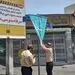 تصویری عجیب از جمع‌آوری بنر پزشکیان توسط شهرداری تهران