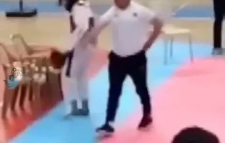 پس‌گردنی مربی به دختر جوان تکواندوکار