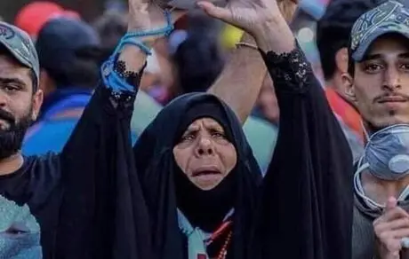 زن عراقی که به خاطر برد عراق مقابل ایران جهانی شد!