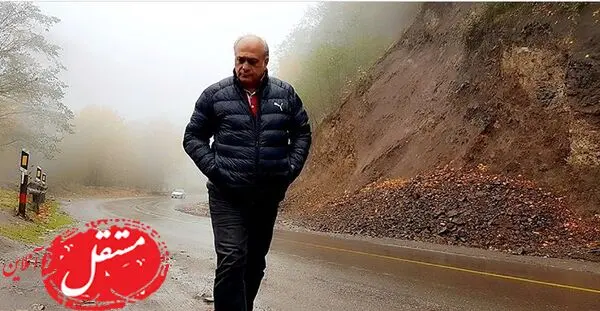 قدم زدن آقای بازیگر در جاده ی بارانی + عکس